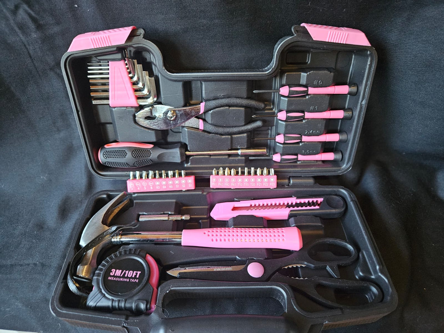 Pink tool set in black case